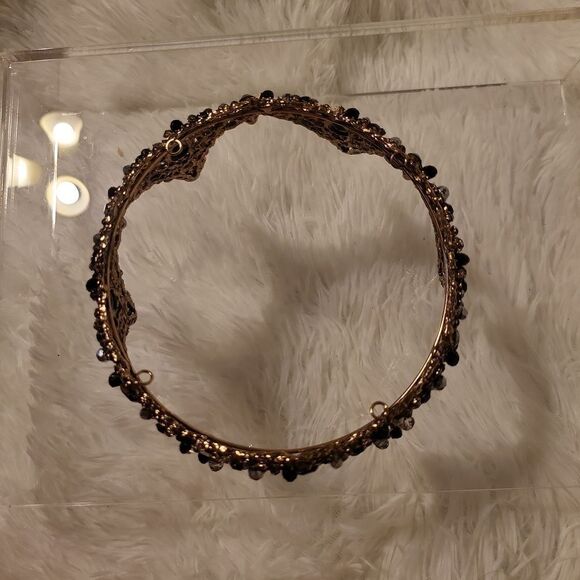 A full round tiara worn twice has 2 stones missing, beautiful!!!